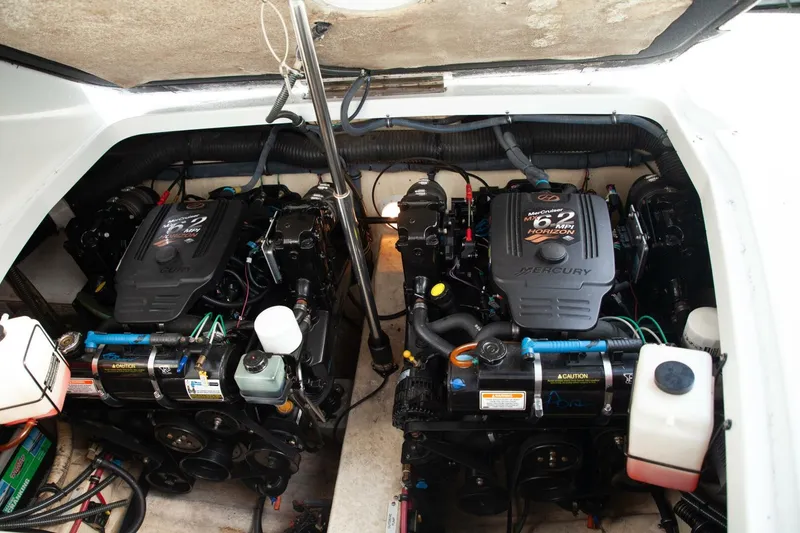 Slide: The Image of Engine compartment of a 2006 Formula 31 Performance Cruiser with twin Mercury engines. - 33