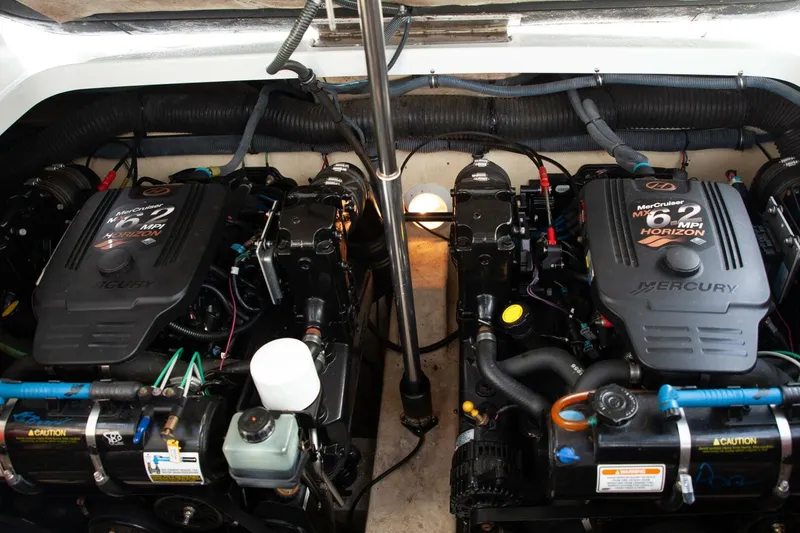 Slide: The Image of The engine compartment of a 2006 Formula 31 Performance Cruiser with twin Mercury engines. - 35