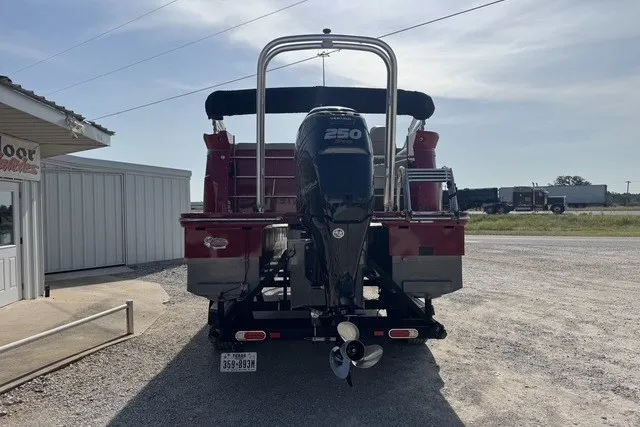 Slide: The Image of 2018 Larson Escape 23 Triple TTT boat with powerful 250 HP outboard motor. - 3