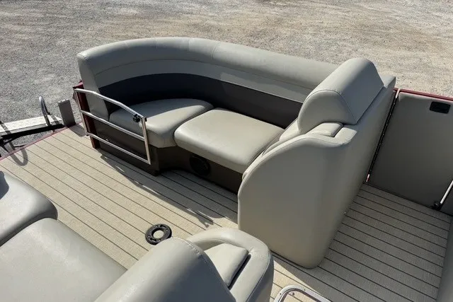 Slide: The Image of 2018 Larson Escape 23 Triple TTT pontoon boat with spacious seating and sleek design. - 16