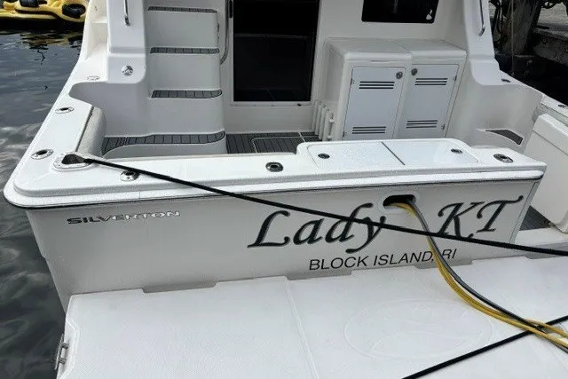 Slide: The Image of 2006 Silverton 34 Convertible boat docked, named "Lady KT," Block Island, RI. - 4