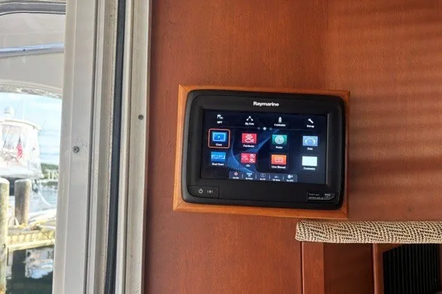 Slide: The Image of Raymarine navigation system on 2006 Silverton 34 Convertible yacht interior. - 9