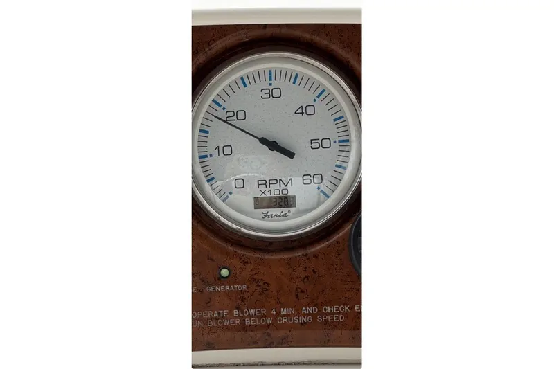 Slide: The Image of Close-up of a 2006 Silverton 34 Convertible tachometer displaying RPM. - 24
