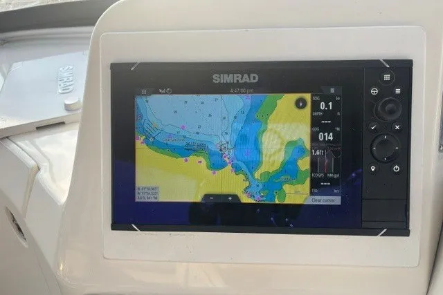 Slide: The Image of Simrad navigation display on 2006 Silverton 34 Convertible boat, showing nautical chart. - 22