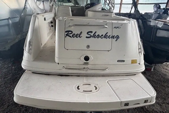 Slide: The Image of 2005 Sea Ray 270 Amberjack boat with "Reel Shocking" name on the stern. - 4