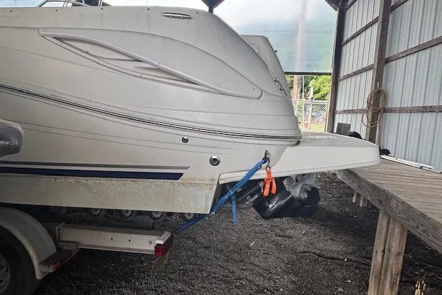 Slide: The Image of 2005 Sea Ray 270 Amberjack boat on trailer in covered storage area. - 3
