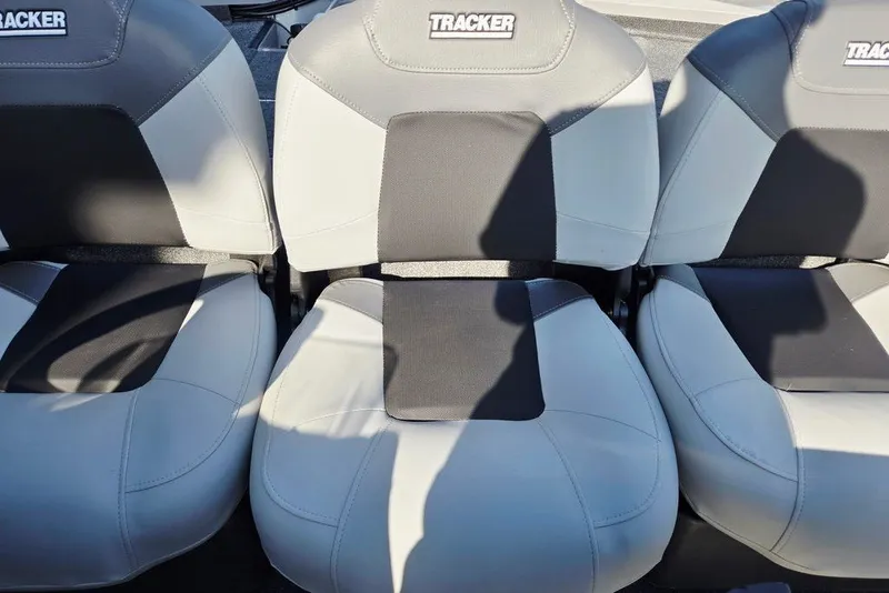 Slide: The Image of 2027 Tracker Pro Team 175 Crappie Edition boat seats, featuring gray and black upholstery. - 40