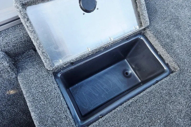 Slide: The Image of Open storage compartment in 2027 Tracker Pro Team 175 Crappie Edition boat. - 17