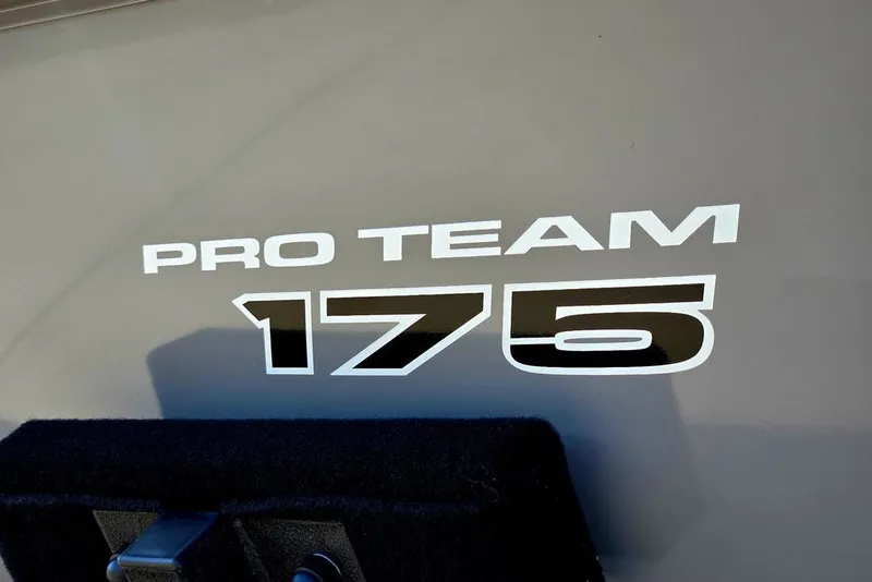 Slide: The Image of Tracker Pro Team 175 Crappie Edition 2027 model logo on boat exterior. - 18