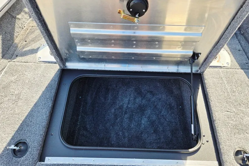Slide: The Image of Open storage compartment on 2027 Tracker Pro Team 175 Crappie Edition boat. - 28