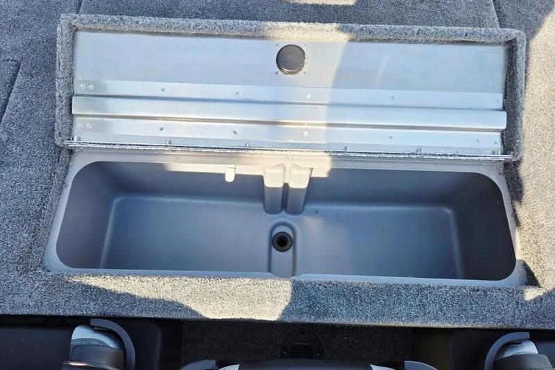 Slide: The Image of Open storage compartment in 2027 Tracker Pro Team 175 Crappie Edition boat. - 30