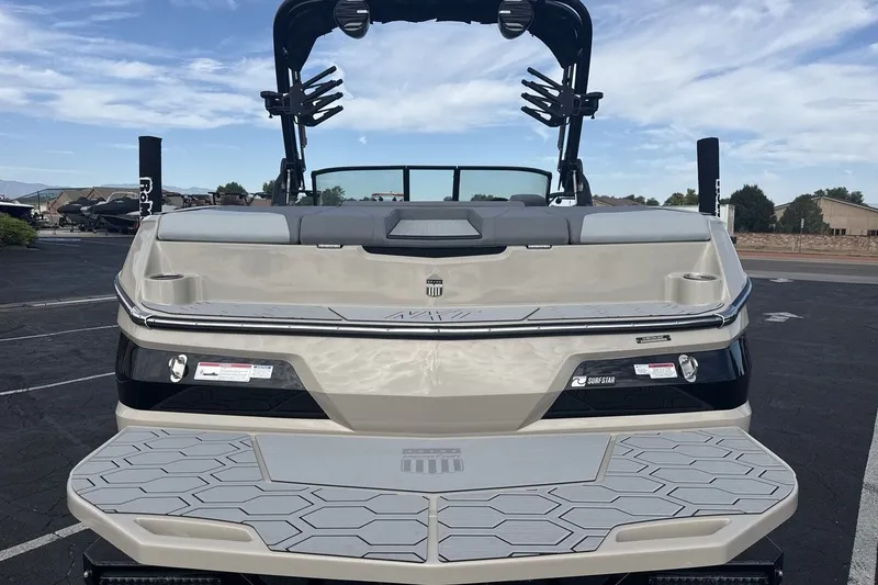 Slide: The Image of The image shows the rear of a 2027 MasterCraft NXT23 boat with a modern design. - 4