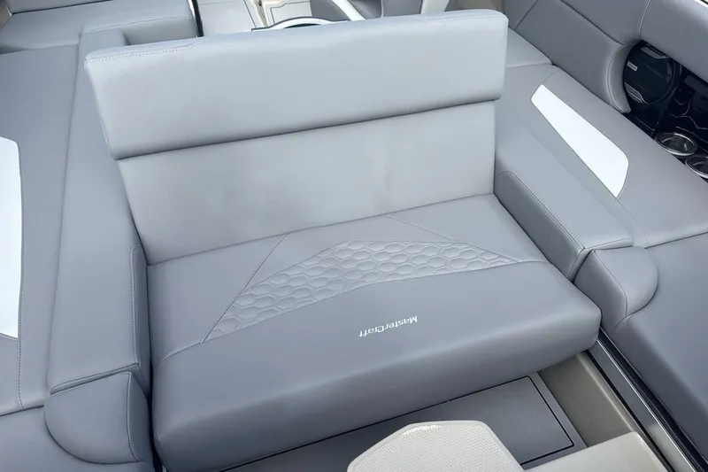 Slide: The Image of Gray upholstery on a boat seat with MasterCraft logo, modern and stylish design. - 23