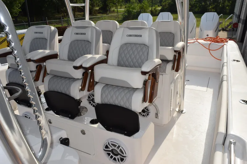 Slide: The Image of Luxury seating on 2027 Contender 44 ST boat, featuring plush, diamond-stitched upholstery. - 25