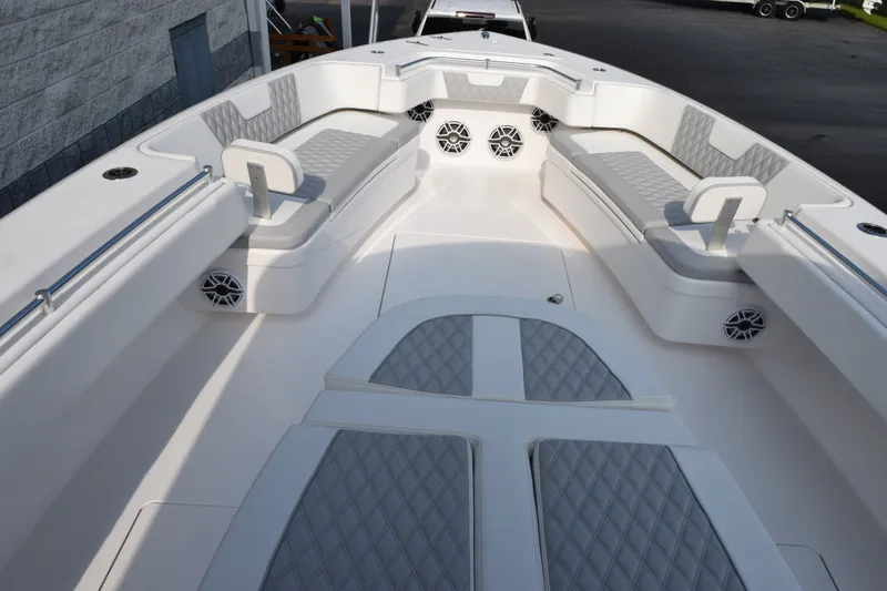 Slide: The Image of 2027 Contender 44 ST boat interior with cushioned seating and modern design. - 21