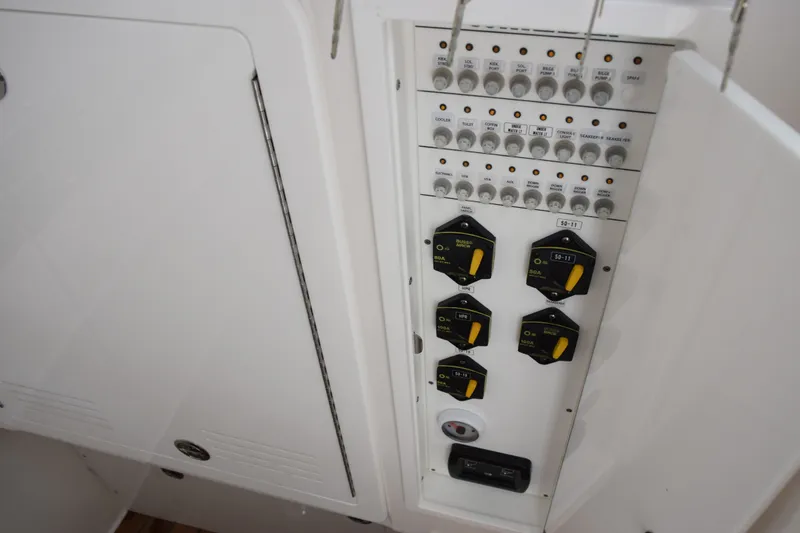 Slide: The Image of Electrical panel of 2027 Contender 44 ST boat with switches and controls. - 29