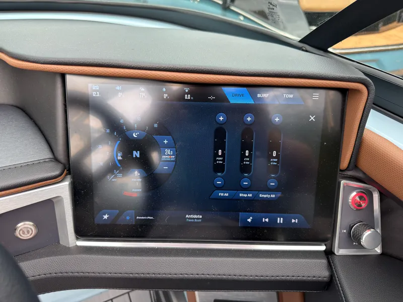 Slide: The Image of The image shows the dashboard of a 2027 MasterCraft XT20 with a modern touchscreen display. - 40