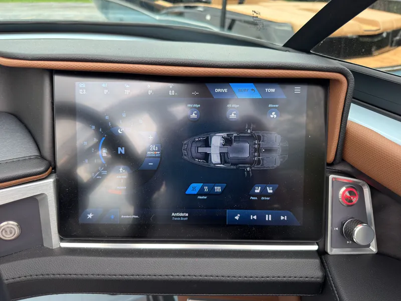 Slide: The Image of The image shows the dashboard of a 2027 MasterCraft XT20 with a modern touchscreen display. - 47