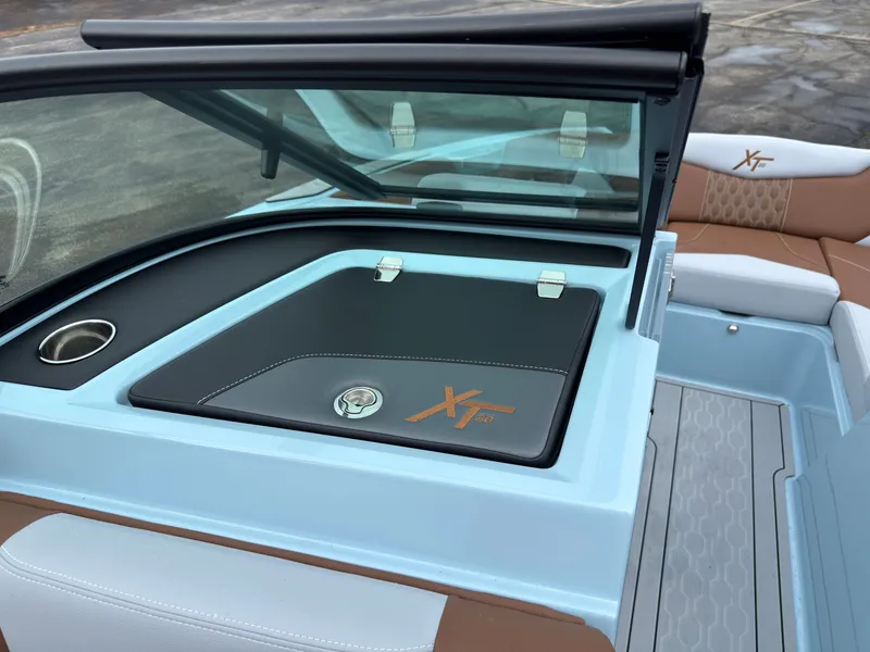 Slide: The Image of The image shows the cockpit of a 2027 MasterCraft XT20 with modern seating and sleek design. - 31