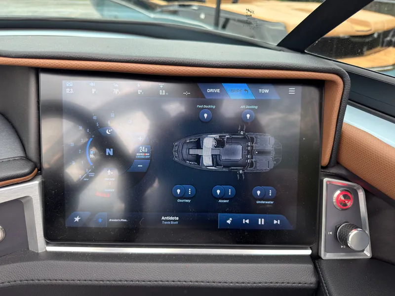 Slide: The Image of The image shows the dashboard of a 2027 MasterCraft XT20 with a modern touchscreen display. - 46