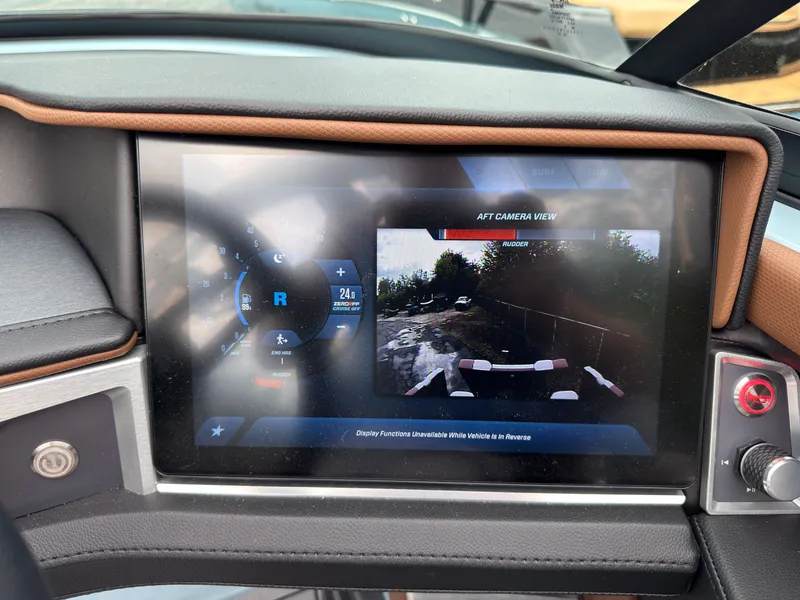 Slide: The Image of The image shows the dashboard of a MasterCraft XT20 with a rear-view camera display. - 39
