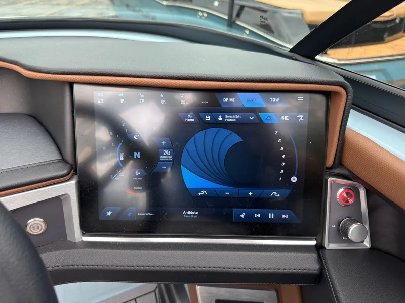 Slide: The Image of The image shows the dashboard of a 2027 MasterCraft XT20 with a modern touchscreen display. - 41