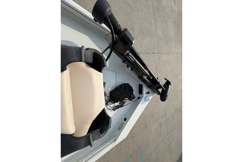 Slide: The Image of 2019 Excel 203 Bay Pro boat interior with trolling motor and seat. - 12