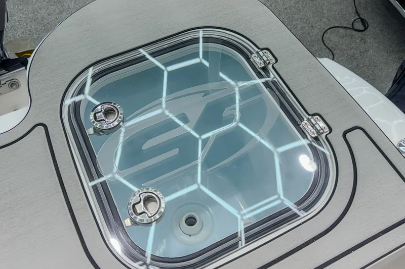 Slide: The Image of Livewell hatch on 2022 Sea Fox 288 Commander boat, featuring sleek design and secure latches. - 18