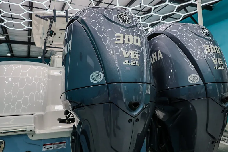 Slide: The Image of Twin Yamaha 300 V6 engines on a 2022 Sea Fox 288 Commander boat. - 6