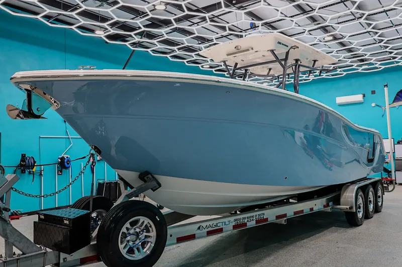 The Image of 2022 Sea Fox 288 Commander boat on trailer in indoor showroom. - 1