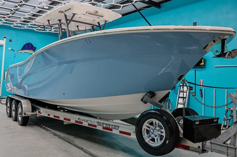 Slide: The Image of 2022 Sea Fox 288 Commander boat on trailer in showroom. - 2