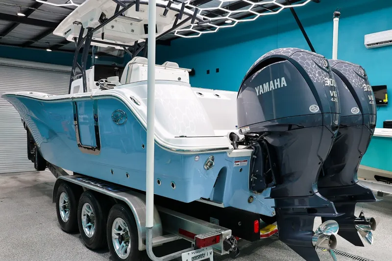 Slide: The Image of 2022 Sea Fox 288 Commander boat with dual Yamaha engines on a trailer. - 4