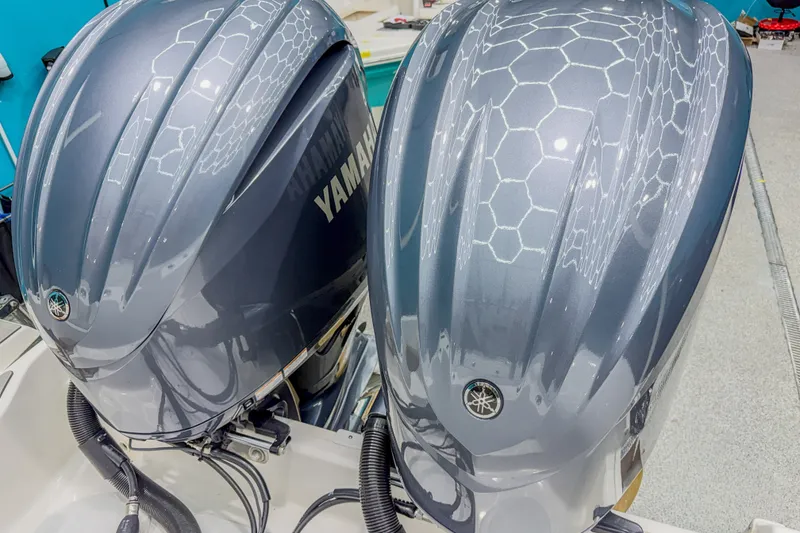 Slide: The Image of Twin Yamaha outboard engines on a 2022 Sea Fox 288 Commander boat, featuring sleek design. - 7