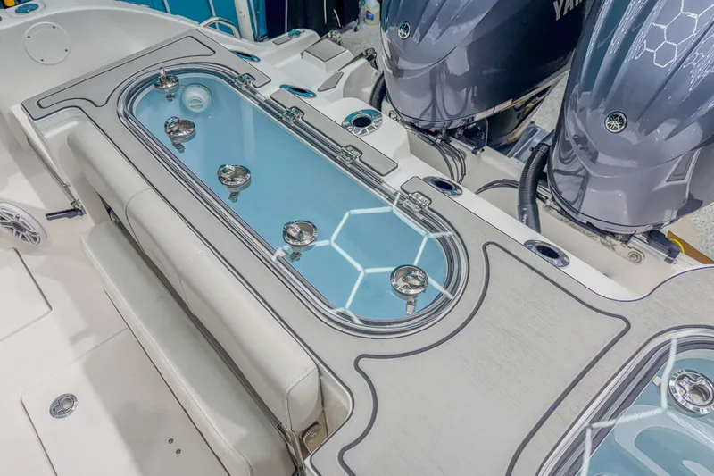 Slide: The Image of 2022 Sea Fox 288 Commander boat with dual Yamaha engines and sleek seating area. - 17