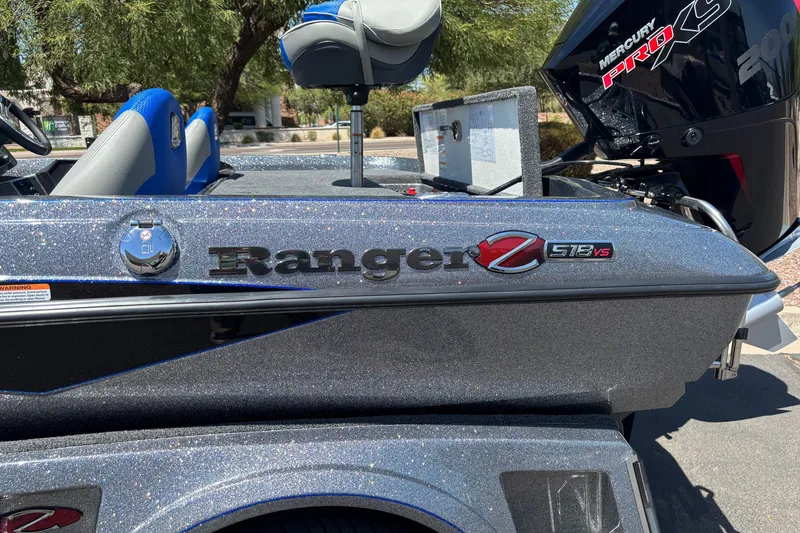 Slide: The Image of 2027 Ranger Z518 Cup-Equipped boat with Mercury Pro XS engine, metallic finish. - 1