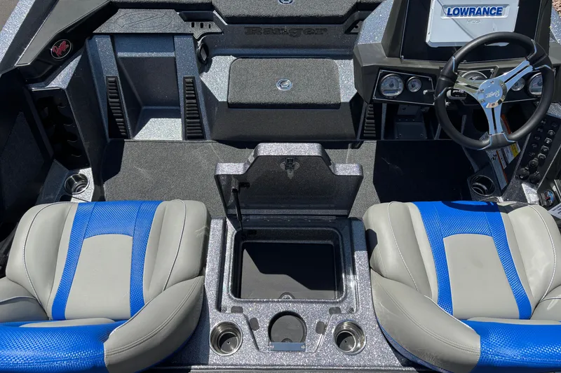 Slide: The Image of Interior of 2027 Ranger Z518 Cup-Equipped boat with blue and gray seating. - 8