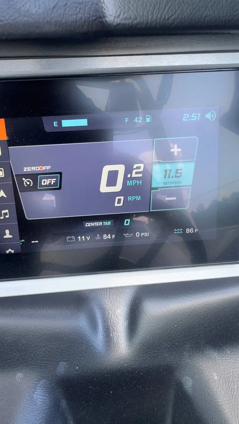 Slide: The Image of The image shows the dashboard of a 2022 Supreme S220 boat with digital displays. - 10