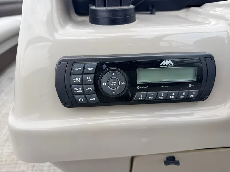 Slide: The Image of A marine audio system is integrated into the dashboard of a boat. - 25