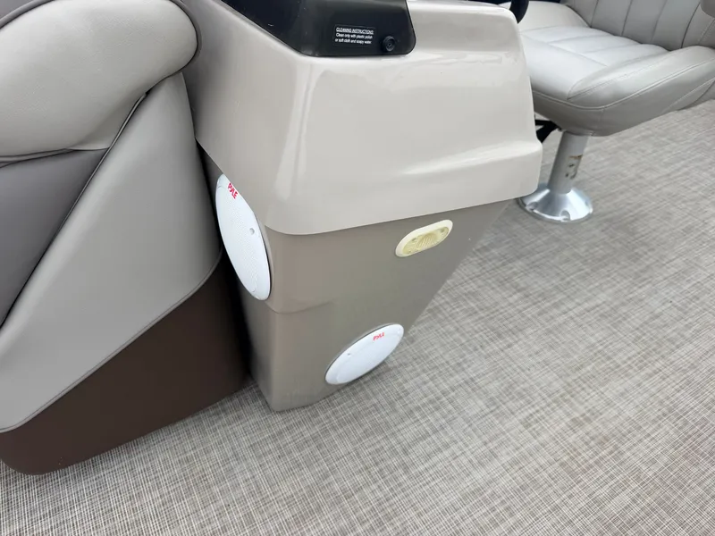 Slide: The Image of Close-up of a boat interior with speakers and cushioned seating. - 20