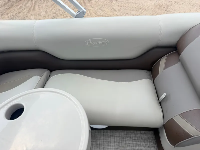 Slide: The Image of The image shows a luxurious seating area on a boat with a small table. - 30
