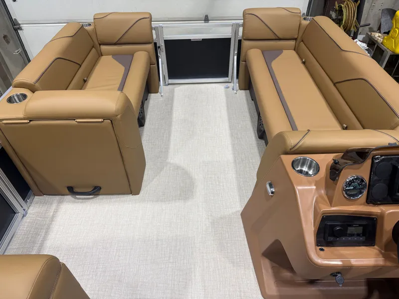 Slide: The Image of Interior of the Tahoe Sport 1980 Cruise with beige leather seating and control console. - 23