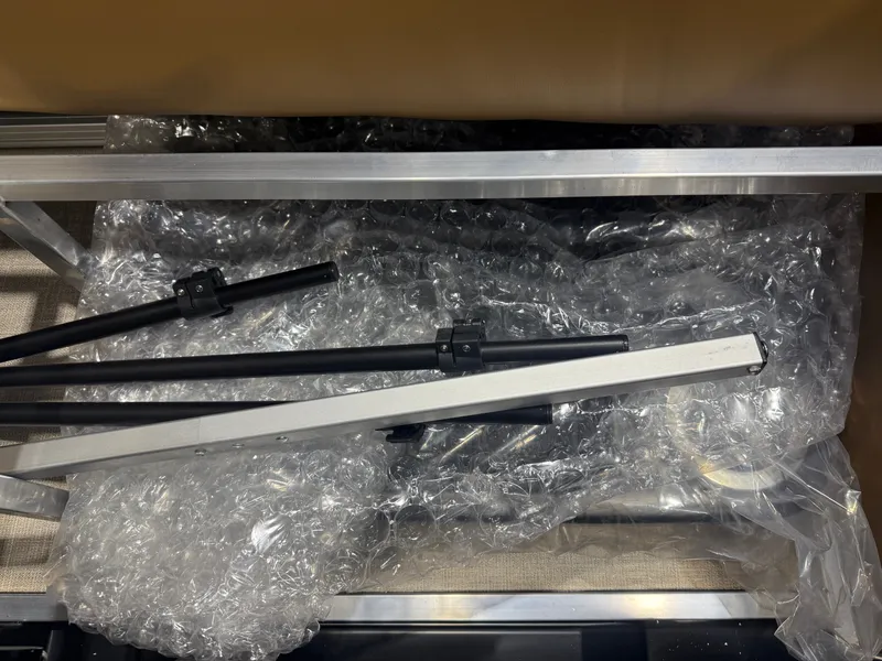 Slide: The Image of Close-up of metal rods and bubble wrap inside a boat. - 30