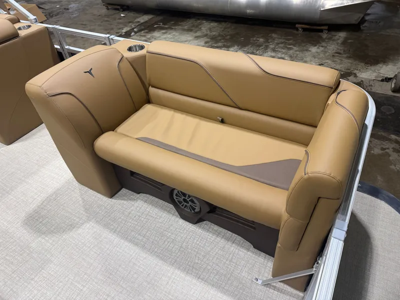 Slide: The Image of The image shows a beige bench seat with modern stitching and a speaker underneath. - 8
