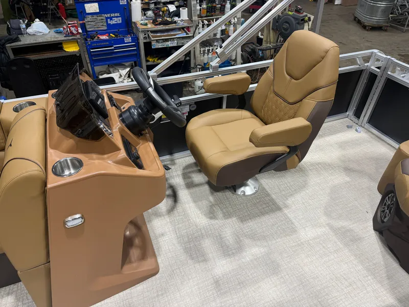 Slide: The Image of The image shows the helm of a modern boat with a comfortable, padded captain's chair. - 9