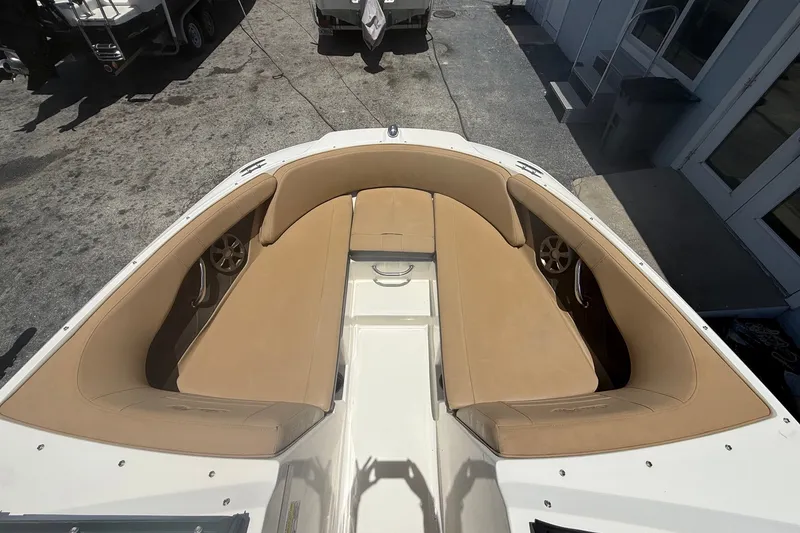 Slide: The Image of 2019 Sea Ray SPX 190 Outboard boat with tan seating and spacious bow area. - 10