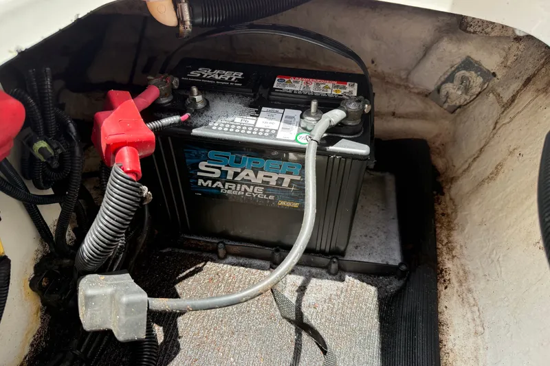 Slide: The Image of Marine battery in a 2019 Sea Ray SPX 190 Outboard boat compartment. - 39