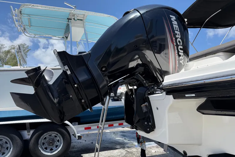 Slide: The Image of 2019 Sea Ray SPX 190 Outboard with Mercury engine, parked on a trailer. - 47