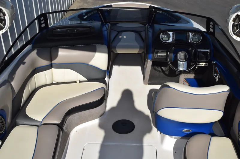 Slide: The Image of 2013 Malibu Wakesetter 23 LSV interior with sleek seating and modern dashboard design. - 7