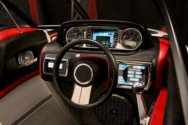 Slide: The Image of Manufacturer Provided Image: 2013 Malibu Wakesetter 23 LSV dashboard with steering wheel and control panel. - 22