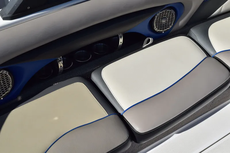 Slide: The Image of 2013 Malibu Wakesetter 23 LSV interior seating with speakers and cup holders. - 9